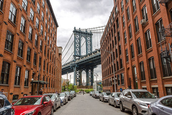 Brooklyn neighborhood street with Manhattan Bridge